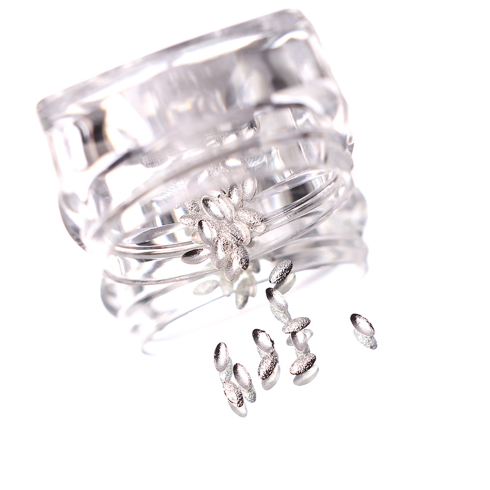 Gallery image of Komilfo texture rivets large oval 1.5*3 mm, silver, 50 pcs