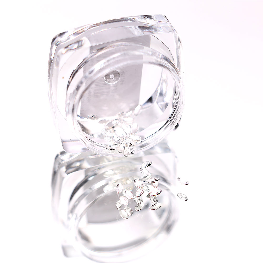 Gallery image of Komilfo texture rivets large oval 1.5*3 mm, silver, 50 pcs
